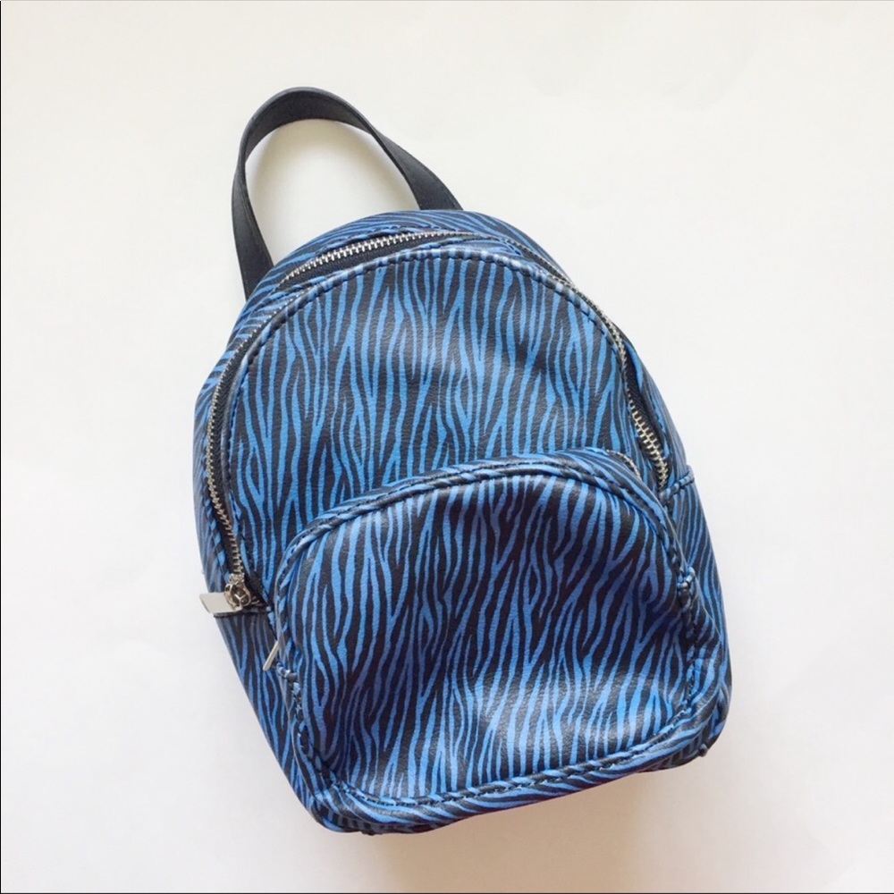 blue zebra printed mini bookbag